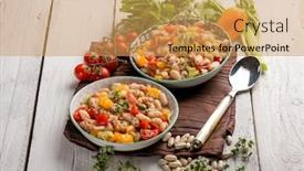  Presentation with tuna can - Amazing slide deck having salad with tuna cannellini beans pepper and tomatoes backdrop and a yellow colored foreground