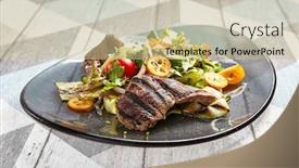  Presentation with main course - Presentation consisting of salad-with-veal-and-kumquat background and a soft green colored foreground