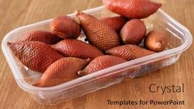 Presentation with salak - Audience pleasing presentation theme consisting of salak fruits also known as snake fruits in a tray backdrop and a red colored foreground