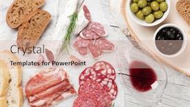  Presentation with bacon - PPT layouts consisting of salami sliced ham sausage prosciutto bacon toasts olives meat antipasto platter and red wine on wooden table top view background and a soft green colored foreground