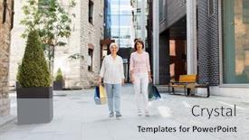  Presentation with city people walking - Beautiful theme featuring sale consumerism and people concept - two senior women or friends with shopping bags walking along tallinn city street backdrop and a light gray colored foreground