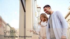  Presentation with consumerism - Presentation theme consisting of sale consumerism and people concept - happy couple with shopping bags pointing finger to shop window on city street background and a soft green colored foreground