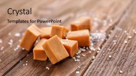  Presentation with old wooden table food - PPT theme having salted caramel candies on wooden background and a coral colored foreground
