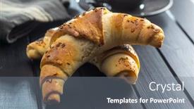  Presentation with croissant - Audience pleasing slide deck consisting of salted-croissant-bun-roll-homemade backdrop and a gray colored foreground