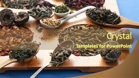  Presentation with tea samples - Colorful presentation enhanced with samples of tea presented on a board spoons and a scoop close up backdrop and a tawny brown colored foreground