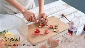  Presentation with fruit cocktail - PPT theme consisting of sangria - woman slicing fresh strawberries background and a coral colored foreground