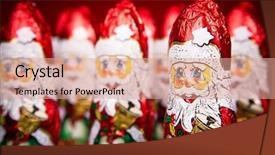  Presentation with santa - Audience pleasing PPT layouts consisting of santa claus chocolate figurine backdrop and a coral colored foreground
