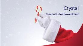  Presentation with old fashioned - PPT theme consisting of santa claus hand holding an old fashioned candy cane over a snowy background hand and arm only with copy space background and a sky blue colored foreground