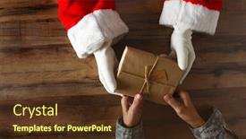  Presentation with santa claus and reindeers - Cool new PPT theme with santa-claus-handing-a-plain backdrop and a tawny brown colored foreground