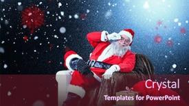  Presentation with snow flakes - Beautiful PPT theme featuring santa claus sitting on sofa with sack of christmas present beside him against snow with red flakes backdrop and a tawny brown colored foreground