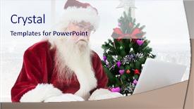  Presentation with santa claus and reindeers - Presentation theme featuring santa claus using laptop during christmas time background and a sky blue colored foreground