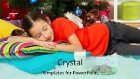  Presentation with christmas girl - Amazing PPT theme having santa cookies - little girl sleeping near christmas backdrop and a cyan colored foreground