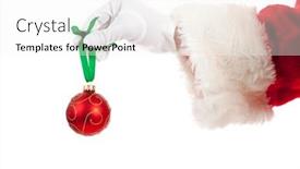  Presentation with ornament - Audience pleasing PPT theme consisting of santa's hand holding a red christmas ornament on a white background backdrop and a sky blue colored foreground