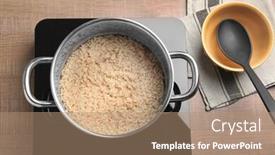  Presentation with brown rice - Beautiful presentation theme featuring saucepan with brown rice on stove backdrop and a coral colored foreground
