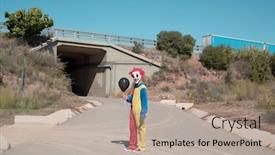  Presentation with red blue yellow - Slide deck with scary clown wearing a colorful yellow red and blue costume outdoors holding a black balloon in his hand standing in the middle of a secondary road at the entrance of a tunnel background and a mint green colored foreground