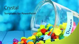  Presentation with dreams - Beautiful theme featuring scattered pieces of paper and colored stones with dreams in glass vase on blue wooden table on blue background backdrop and a teal colored foreground
