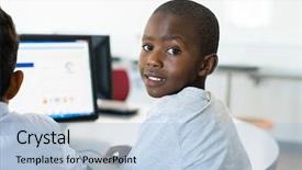  Presentation with black child - PPT theme consisting of school - african young boy using computer background and a light blue colored foreground