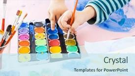  Presentation with watercolor - Colorful PPT theme enhanced with pre school - detail of child's hand painting backdrop and a sky blue colored foreground