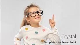  Presentation with vision - Cool new presentation design with school education and vision concept - portrait of smiling little girl in glasses pointing finger up over grey background backdrop and a lemonade colored foreground