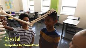  Presentation with elementary - Slide deck having school-kids-playing-with-skeleton background and a tawny brown colored foreground