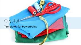  Presentation with thread - Theme having scissors bright thread and measuring tape on fabric isolated on white background and a light blue colored foreground