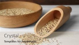  Presentation with quinoa - Beautiful theme featuring scoop and bowl with raw quinoa grains on wooden background backdrop and a coral colored foreground