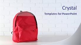  Presentation with backpack - Slide deck consisting of scribbler - school backpack on wooden table background and a sky blue colored foreground