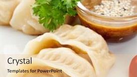  Presentation with dumpling - Colorful theme enhanced with seafood dumpling - gyoza garnished with sauce tomato and parsley backdrop and a lemonade colored foreground