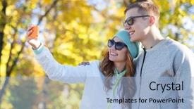  Presentation with holidays - Cool new PPT theme with season vacation holidays technology and friendship concept - smiling couple with smartphone taking selfie over autumn park background backdrop and a light blue colored foreground