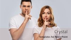  Presentation with secret - Cool new PPT theme with secret conspiracy and people concept - portrait of happy couple in white t-shirts making hush gesture over grey background backdrop and a coral colored foreground