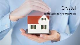  Presentation with toy - Slide set enhanced with security loan - small toy house in hands background and a light blue colored foreground