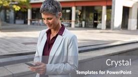  Presentation with entrepreneur - Slide set with senior business woman walking on street while using cellphone successful entrepreneur checking smartphone while standing outside office building mature businesswoman texting message copy space background and a gray colored foreground