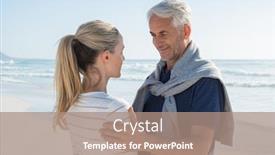  Presentation with senior couple - Theme with senior couple embracing on the beach on a sunny day smiling mature couple looking at each other on the beach retired man in love with his wife background and a coral colored foreground