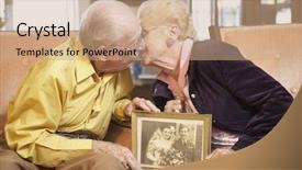  Presentation with wedding muslim couple - Audience pleasing PPT theme consisting of senior couple holding wedding photo backdrop and a coral colored foreground