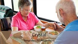  Presentation with senior couple - PPT theme enhanced with senior couple says a prayer background and a coral colored foreground