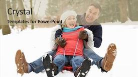  Presentation with woodland - Amazing PPT theme having senior couple sledging through snowy woodland backdrop and a mint green colored foreground