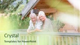  Presentation with log cabin - Beautiful presentation theme featuring senior couple standing oustide log backdrop and a soft green colored foreground