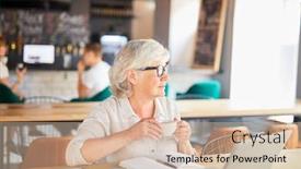  Presentation with tea coffee - Audience pleasing slide deck consisting of senior female with cup of tea or coffee sitting by table in cafe in front of laptop and looking through window backdrop and a soft green colored foreground
