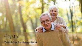  Presentation with wife - Presentation theme with senior man giving his wife a piggyback outdoors background and a gold colored foreground