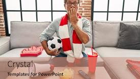  Presentation with football - Presentation consisting of senior-man-watching-football-holding background and a coral colored foreground