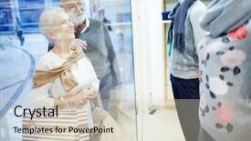  Presentation with attention - Theme with seniors paying attention to new collection of clothes in department store background and a soft green colored foreground