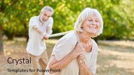  Presentation with tug of war sport - Audience pleasing slides consisting of seniors playing tug of war backdrop and a coral colored foreground