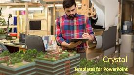  Presentation with planning - Audience pleasing presentation consisting of serious architect concentrating on planning new district while working in his workshop backdrop and a tawny brown colored foreground