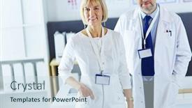  Presentation with medical laptop - Presentation theme having serious-medical-team-using background and a sky blue colored foreground