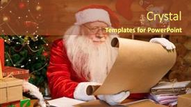  Presentation with reading table - Beautiful presentation featuring serious santa in white gloves eyeglasses and costume reading letter of christmas wishes while sitting by table backdrop and a tawny brown colored foreground