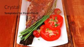  Presentation with main course - Theme having served main course on wood whole fried seabass on plate with lemons tomatoes and peppers background and a red colored foreground