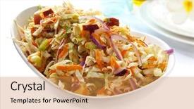  Presentation with celery - Beautiful presentation theme featuring serving bowl of coleslaw salad made with cabbage carrot celery onion and apple backdrop and a gold colored foreground