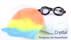  Presentation with swim - Audience pleasing theme consisting of set for pool swim cap goggles and towel isolated on white backdrop and a sky blue colored foreground