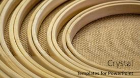  Presentation with embroidery craft - Amazing PPT theme having set-of-bamboo-embroidery-hoops backdrop and a yellow colored foreground