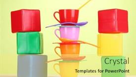  Presentation with light green - Audience pleasing PPT layouts consisting of set of children's dishes and cubes on table on light green background backdrop and a blonde colored foreground